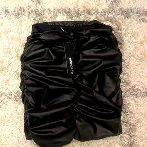 Ruched mini leather skirt